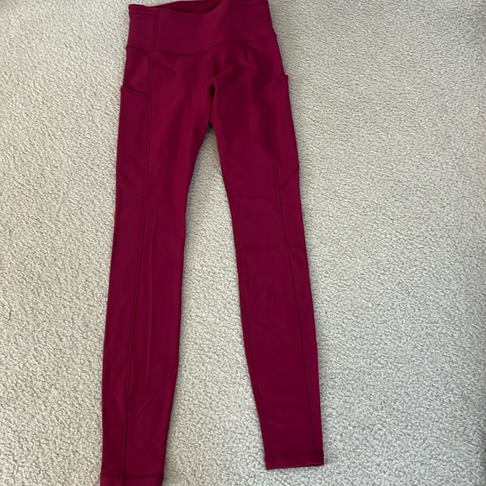 Lululemon 28’ pants , size 4, with fuz inside for warmth, magenta/red/marron